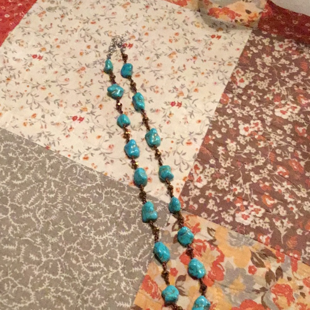 Turquoise and brown necklace.